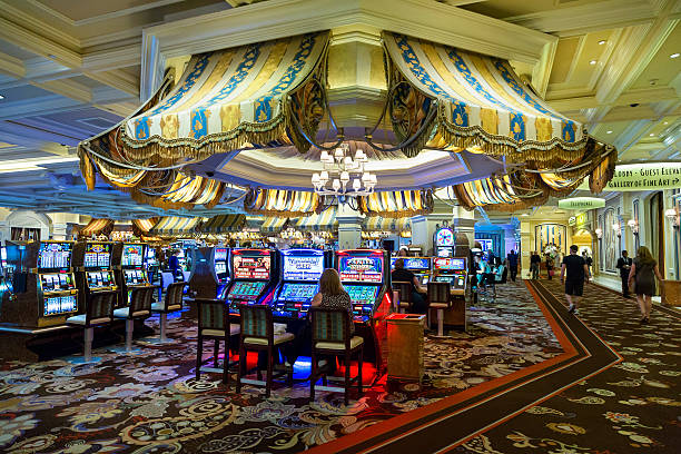 Roulette wheel spinning with betting chips on the table